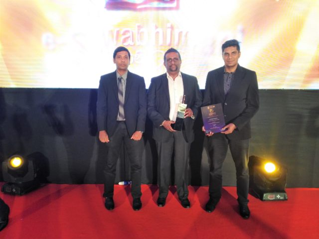 SLTDA - winners of the E Swabhmani award - Udana Wickremasinghe Director ICT, flanked by Hirosh Desilva and Chandana Munasinghe